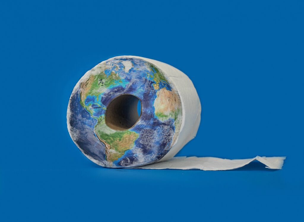 A roll of toilet paper on a blue background.